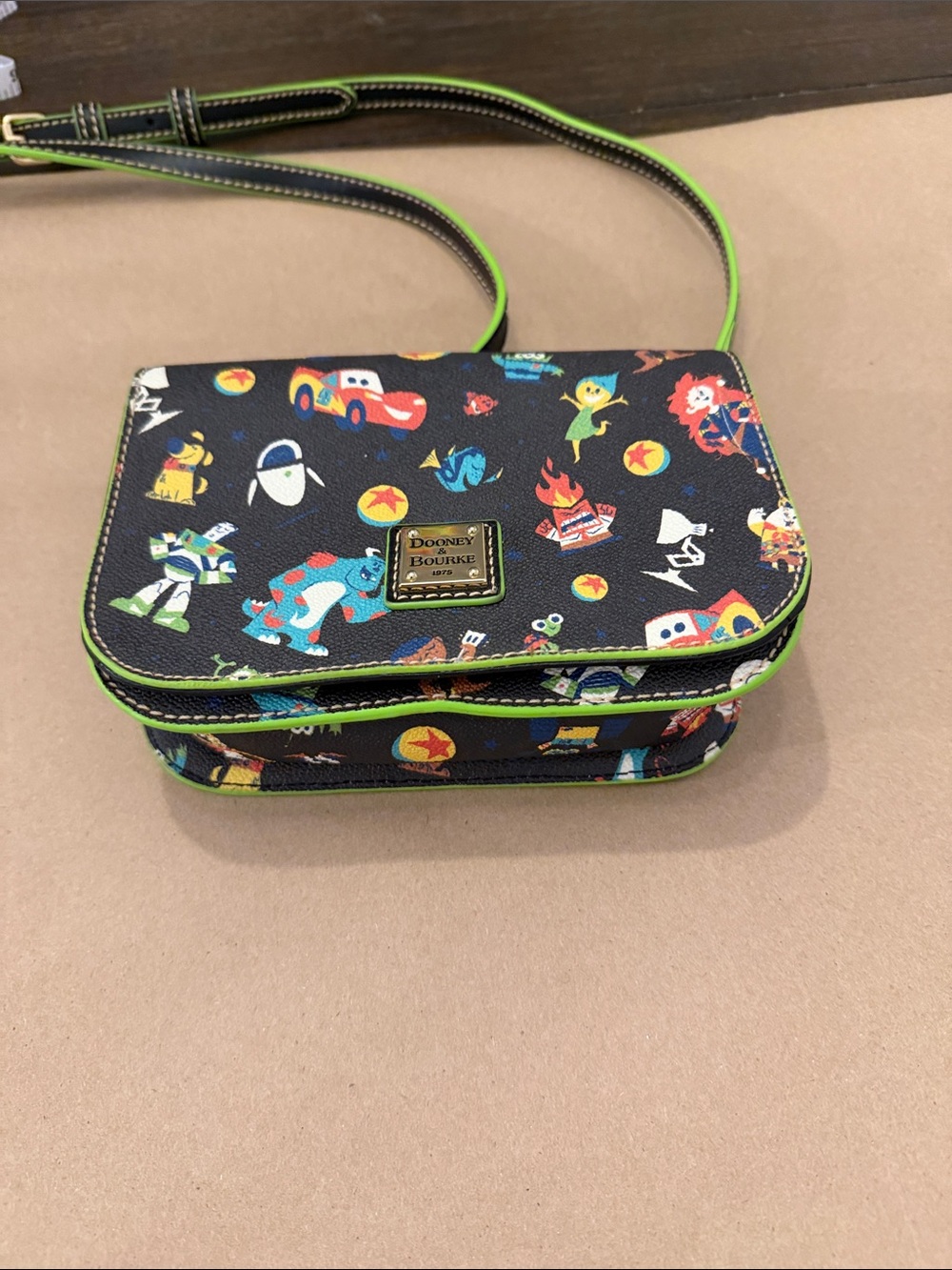 Dooney & Bourke Black Pixar Crossbody with Neon Green Trim